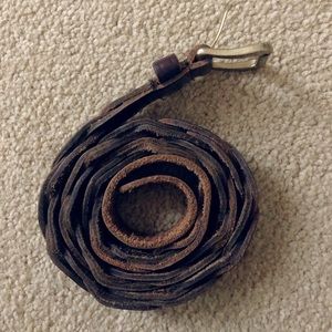 A brown braided belt
